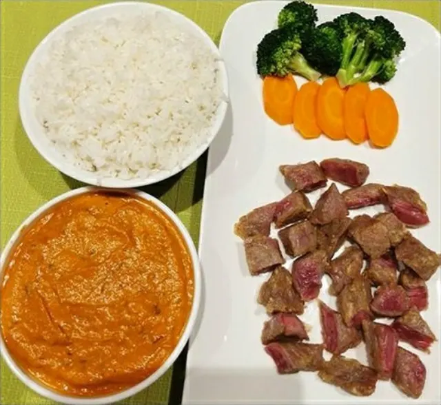 Beef curry with rice and vegetables