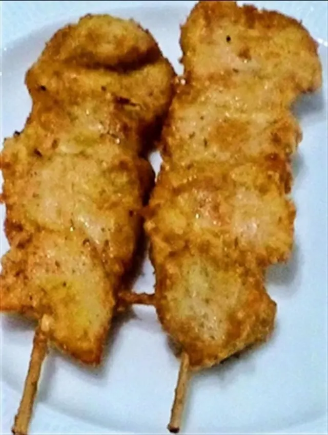 Two chicken yakitori skewers